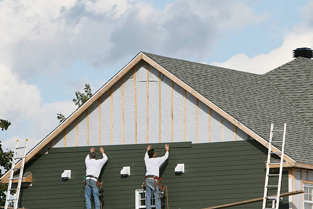Professional Siding Installation technician working in Covington, VA